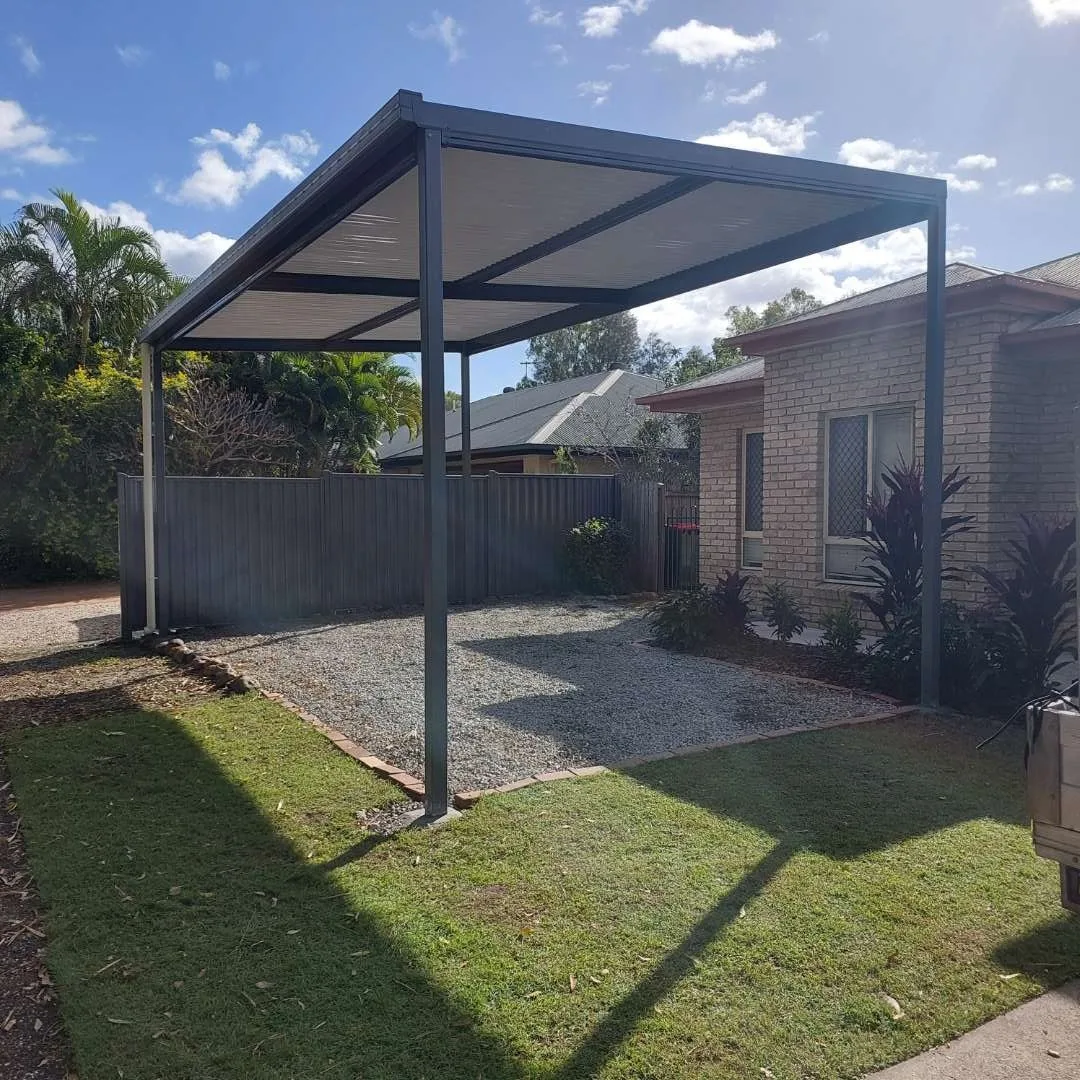 Freestanding flat-roof carport on a Queensland block