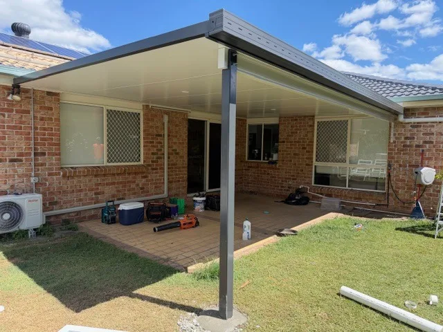 A large entertainment patio over a paved area, built by Dam Good Patios in Brisbane